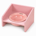 GAVPEPY Raised Ceramic Pet Bowl with Wood Stand, 14.7 cm bowl; 4.2 cm listed height, Pink, Yellow or Blue, for Everyday Dog and Cat Meals or Water at Home, angled bowl held in a low stand; a practical feeding setup for daily pet-care routines